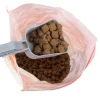 zooplus Basics -pussinsulkija kauhalla